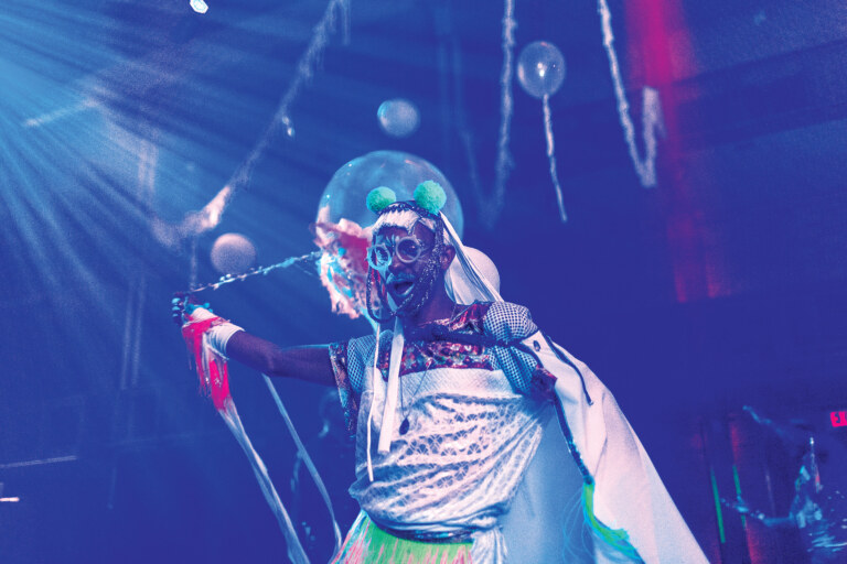 Man in costume performing on stage