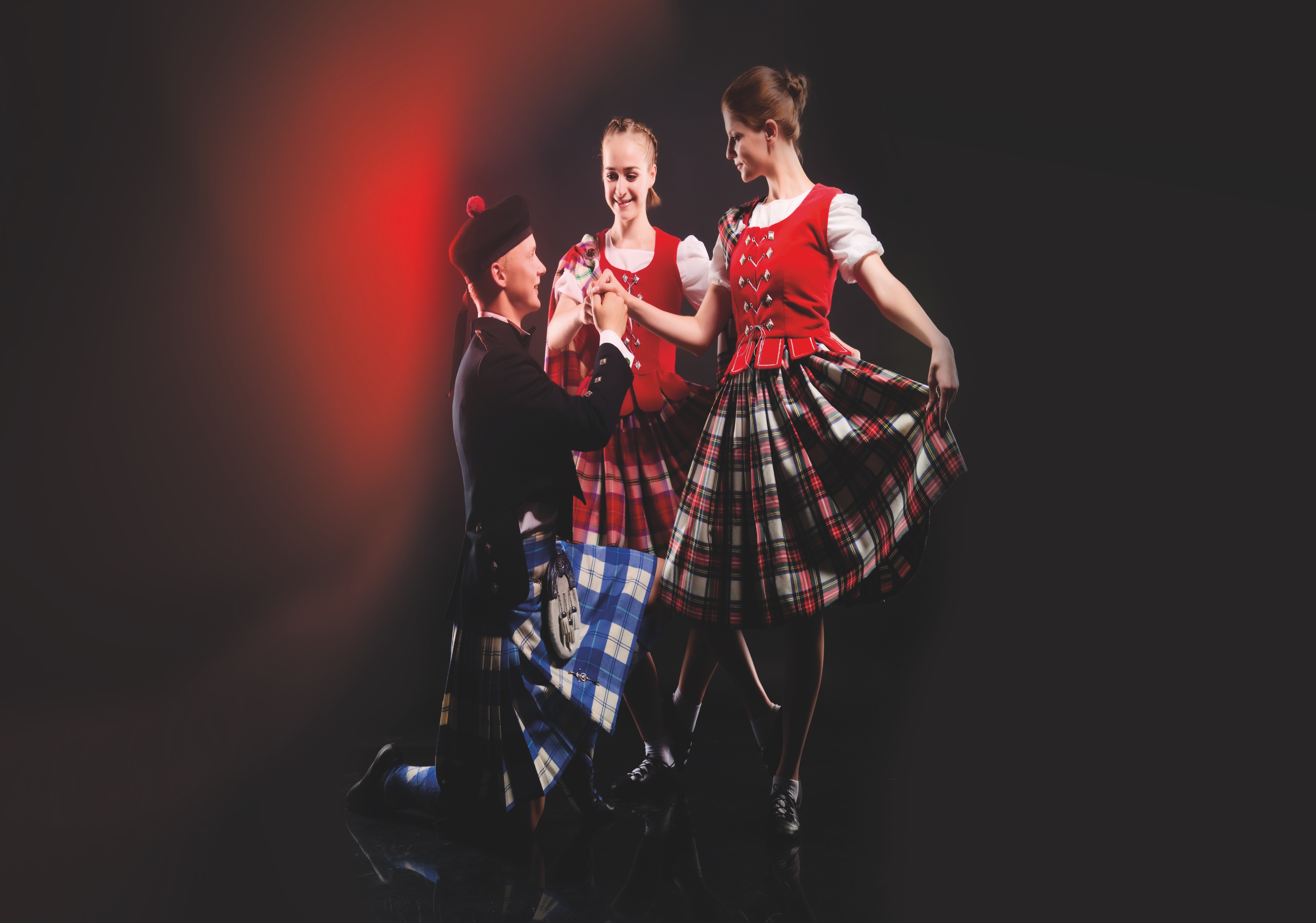 Group of dancers of the Scottish dance in kilts - Abilities Canada ...